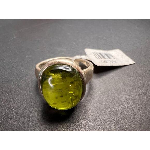 SOLD 

NEW size 7 oval peridot sterling silver ring 6.20 grams - Picture 2 of 15